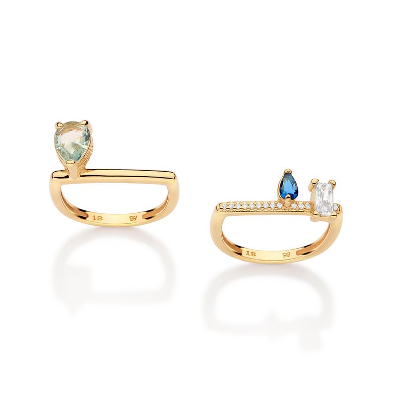 ANILLO DE VARIAS FORMAS CHAPADO EN ORO DE 18K CON CIRCONITAS Y CRISTALES